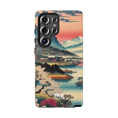 Samsung phone encased in an MVB Studio tough case featuring a traditional Japanese landscape design, with cherry blossoms, a scenic river, a village, and snow-capped mountains under a sunset sky.